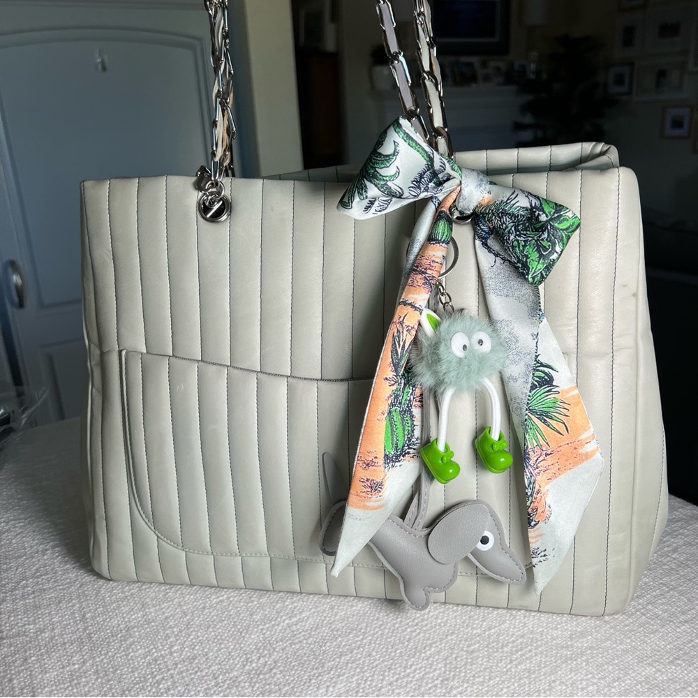 Authentic CHANEL Mademoiselle Large Vertical Quilted Lambskin Leather Tote Bag